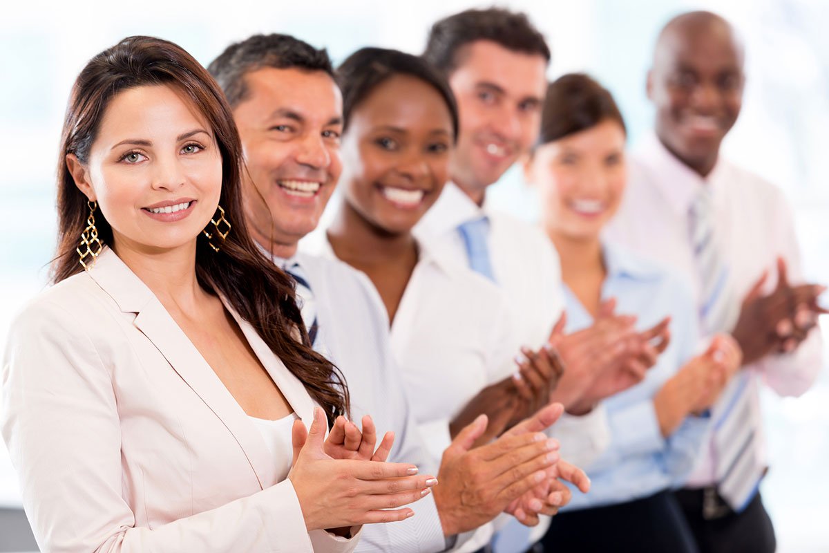 Team applauding for white label WordPress development success
